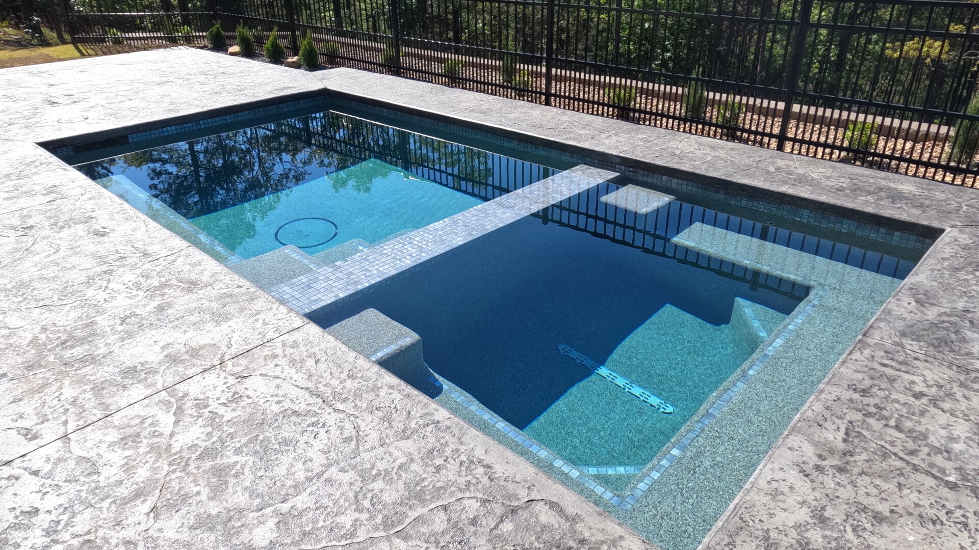 Stunning custom pool at sunset by Banana Hammocks Pool & Spa