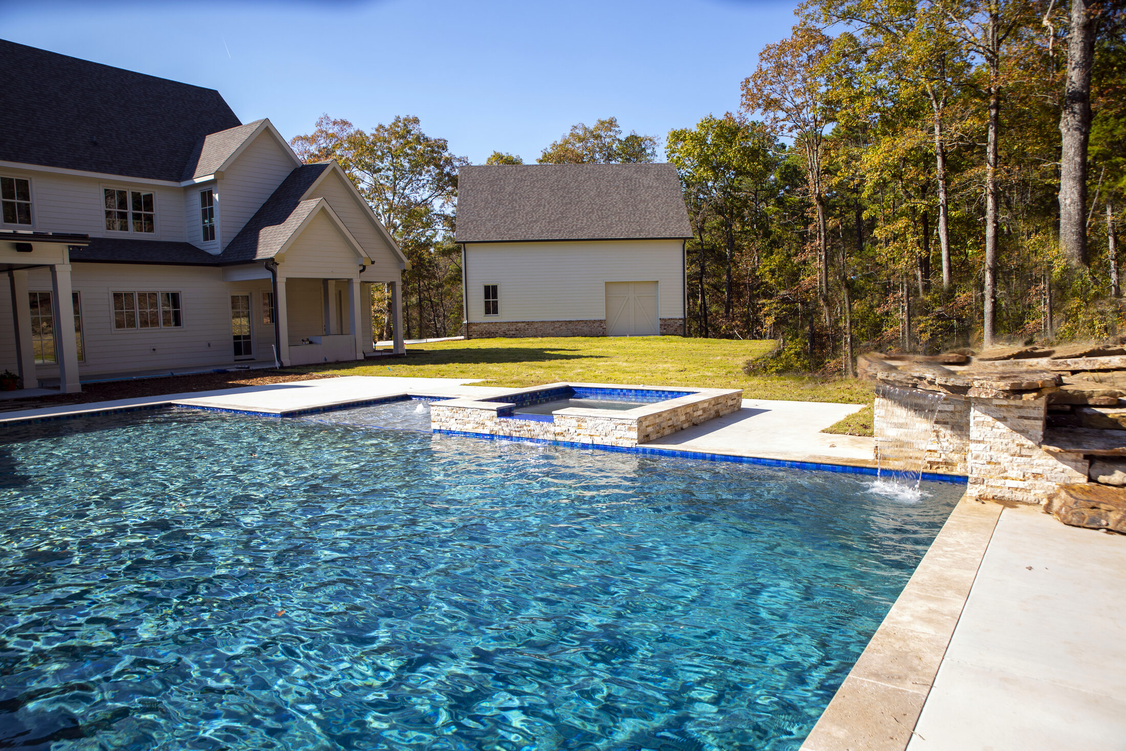 Rectangular pool with natural stone surround