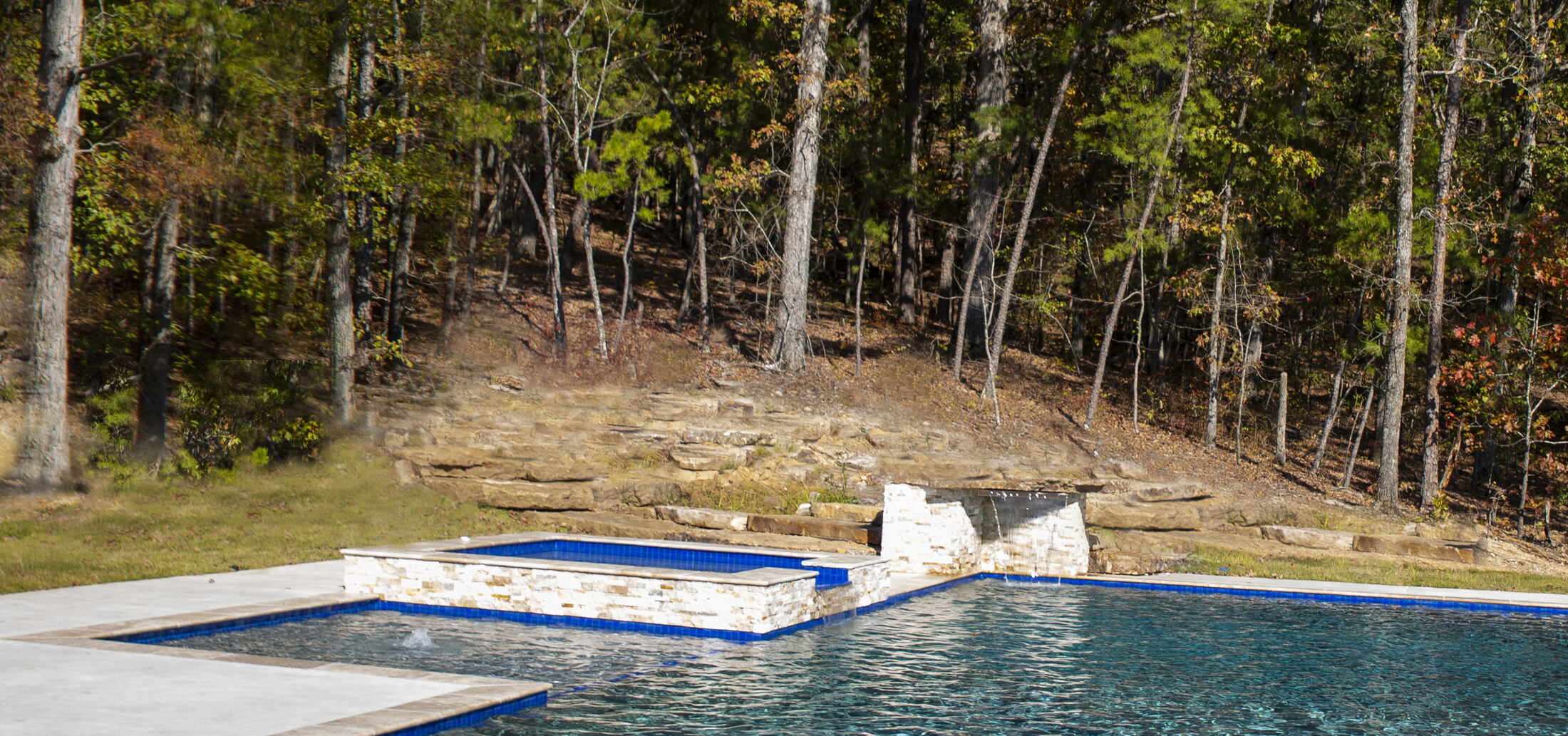 Panoramic countryside view across the pool