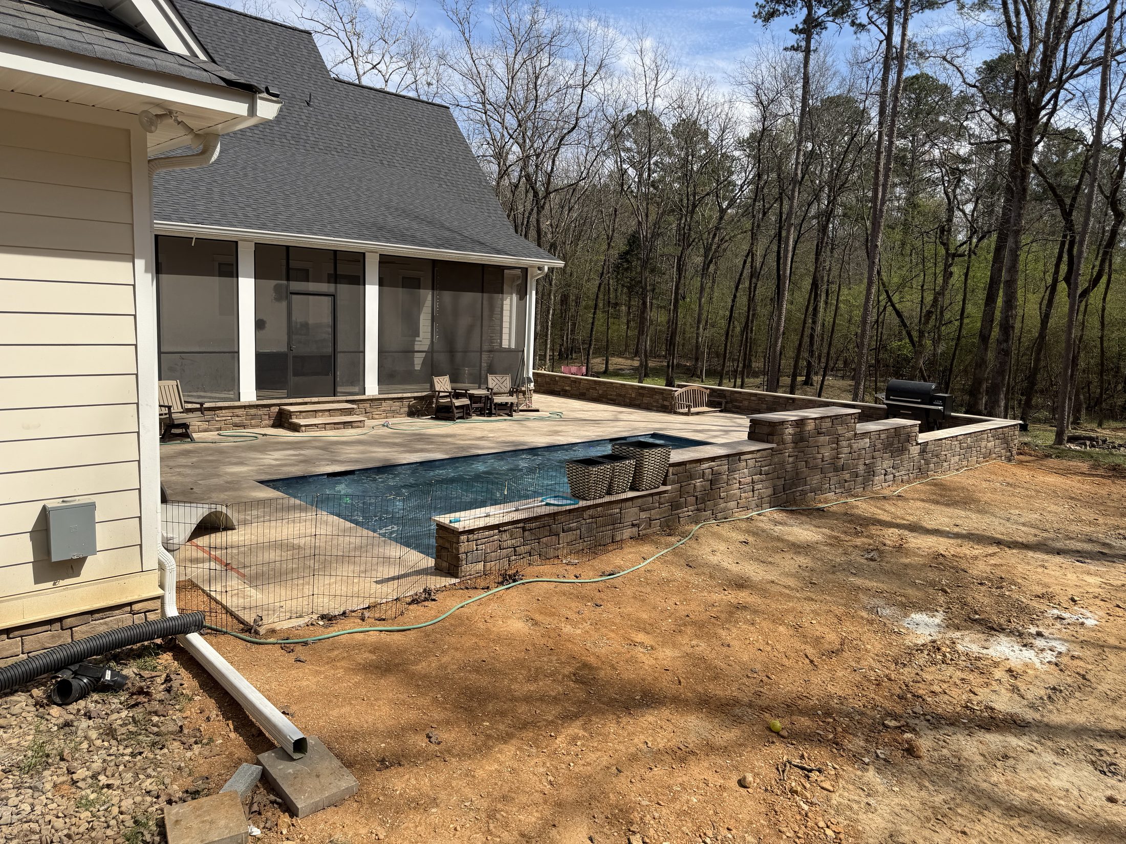 Full view — pool blending seamlessly with the home