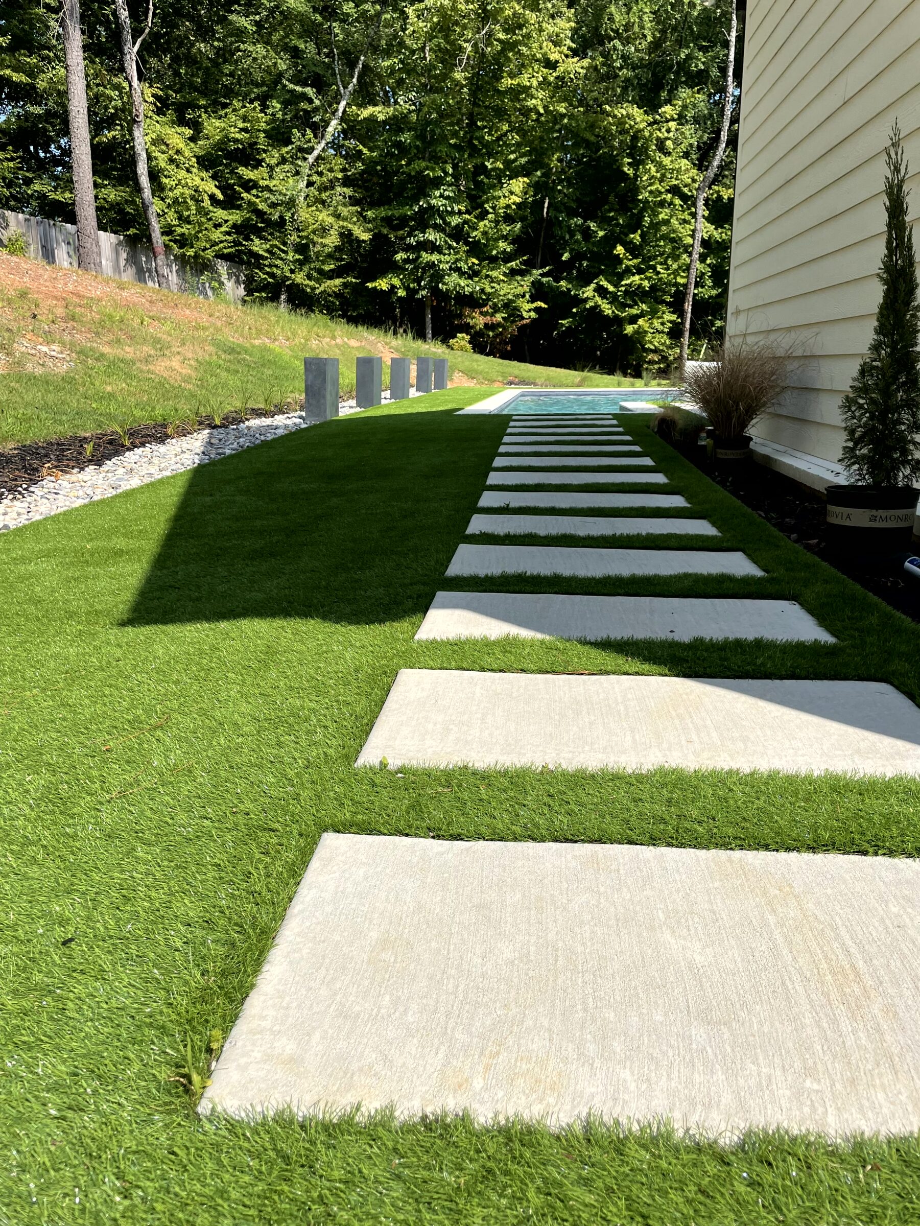Stepping-pad path through astro-turf — close-up