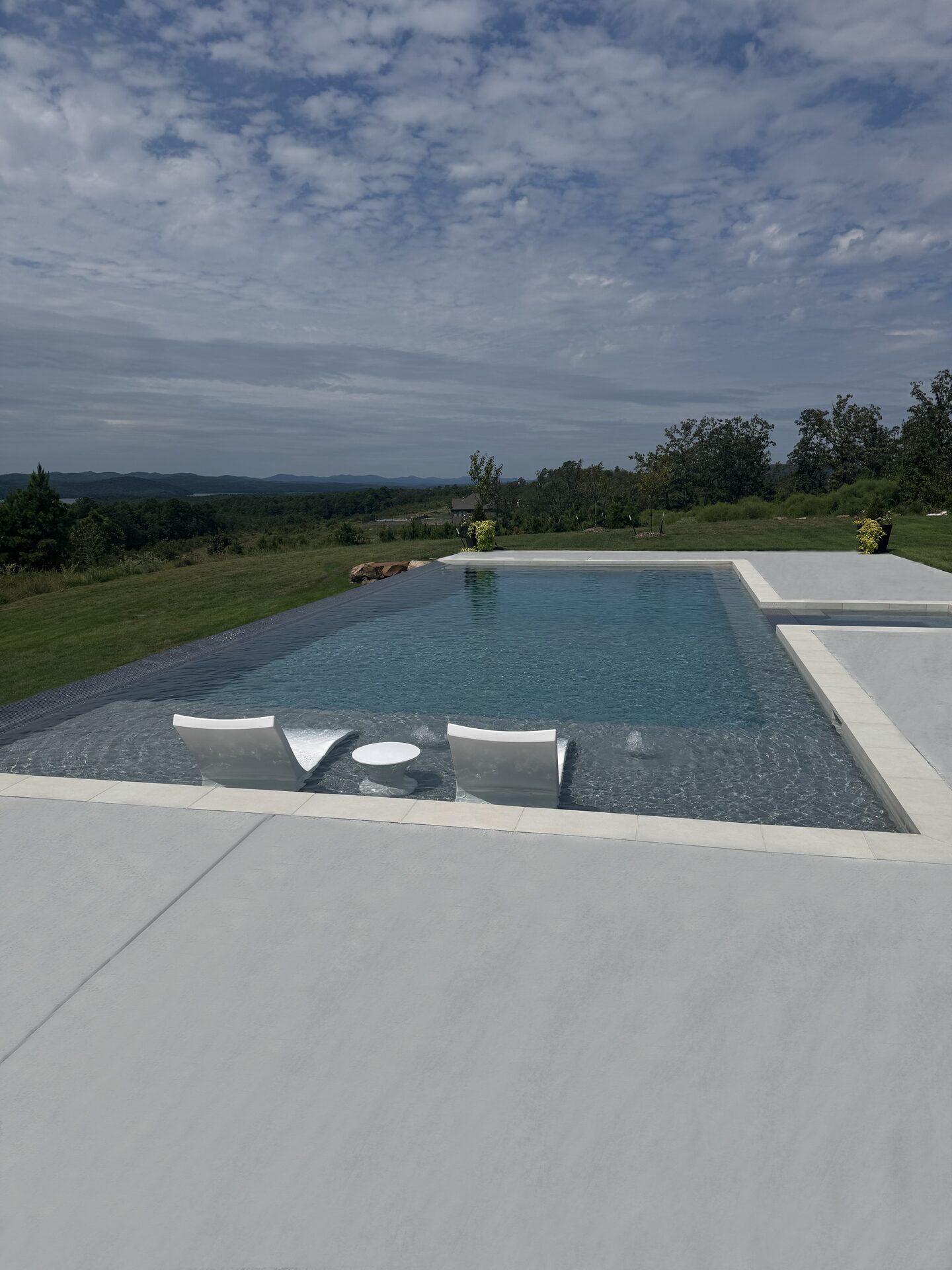 Pool and deck with built-in seating