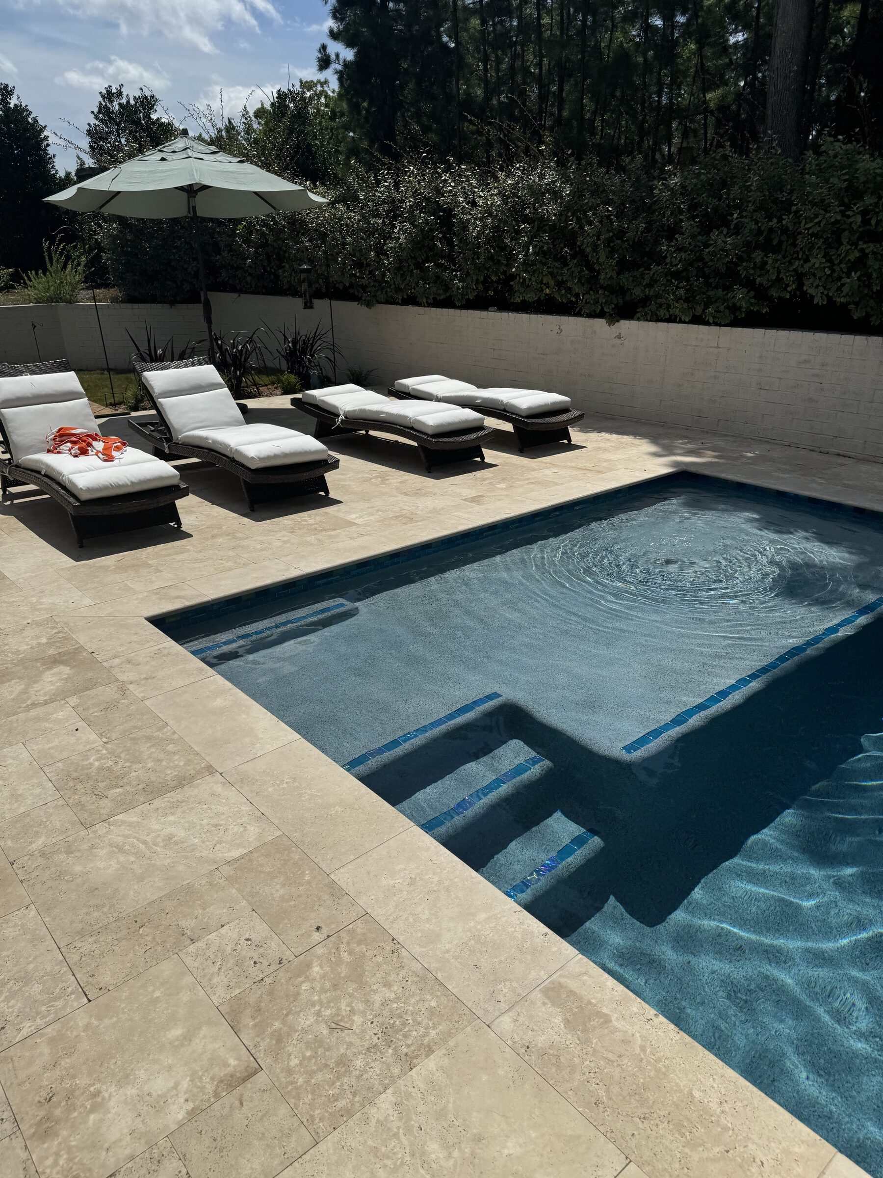 Lounger row and spa with Versailles pattern deck