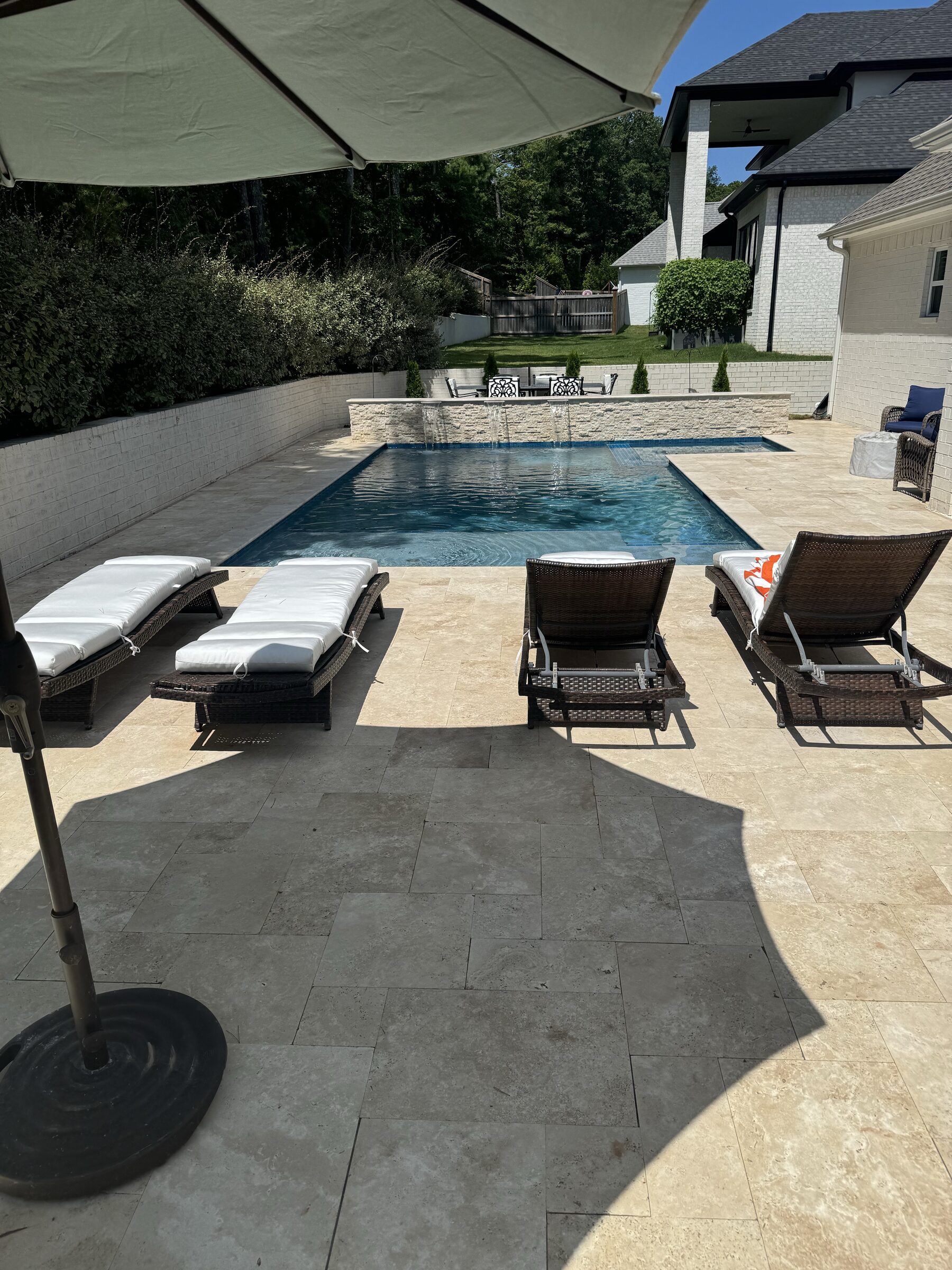 Umbrella shade and lounger deck — wide angle