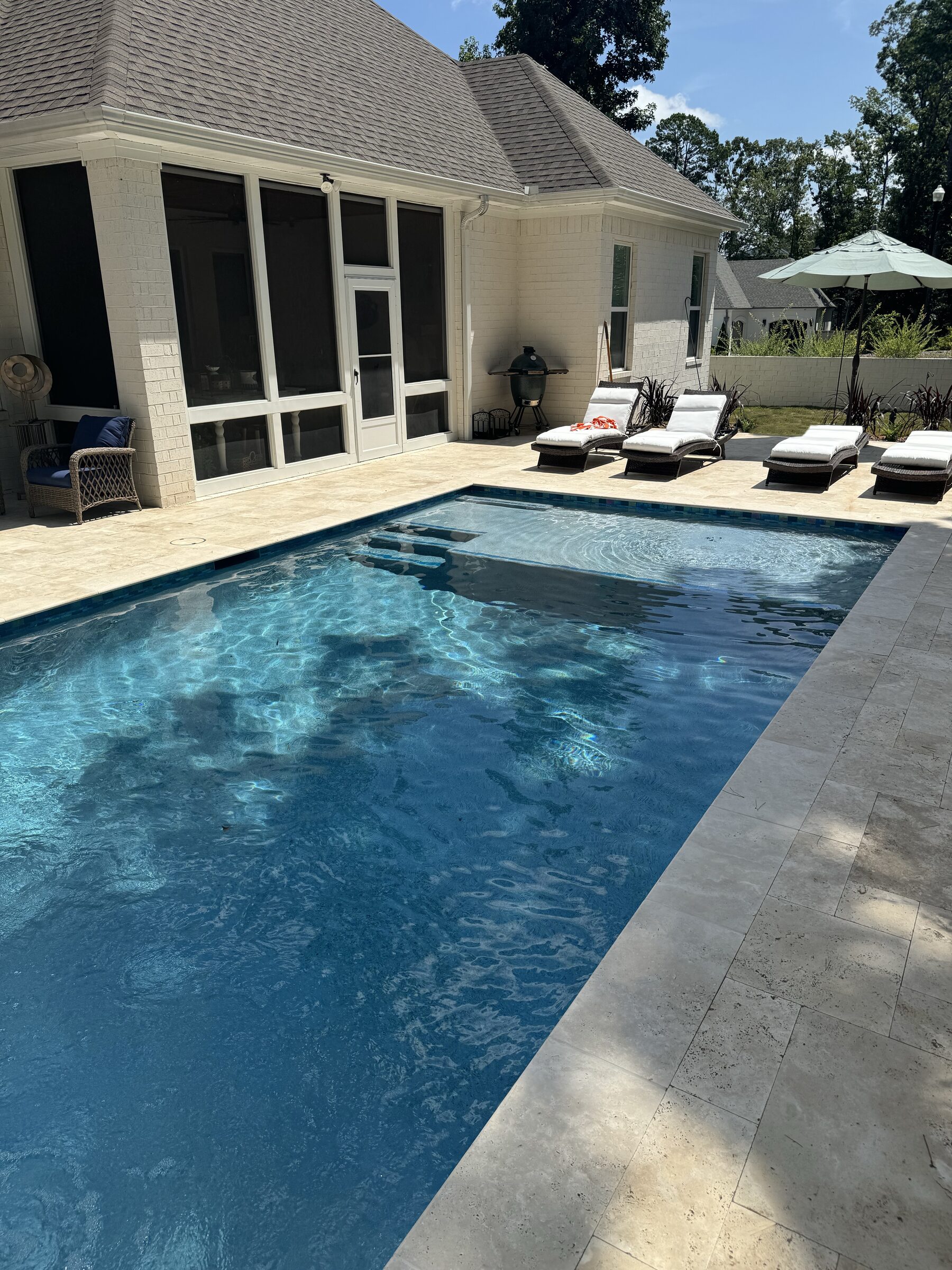 Full view from the pool house — the finished backyard paradise